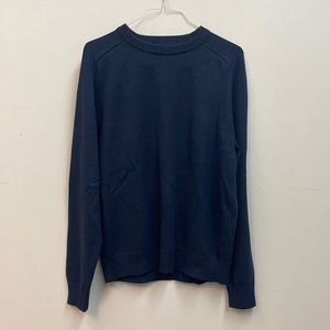 Navy blue men’s J. Crew knit sweater